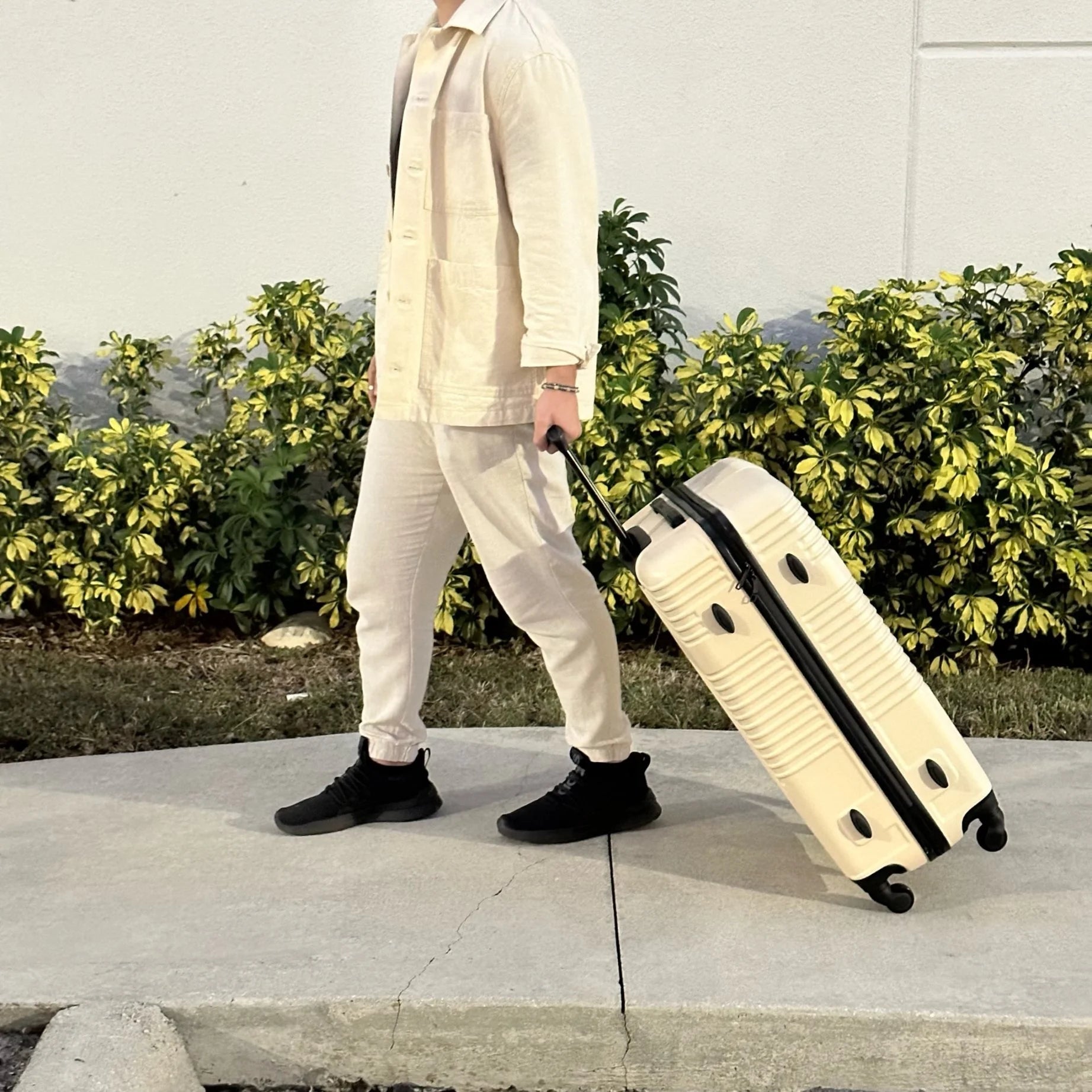 Resilience 24" Hardside Lightweight Luggage with Spinner Wheels, Handle, and Trolley, Sand